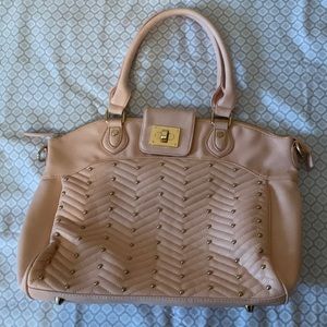 Light Pink Purse with additional cross body strap. Studded design on front.